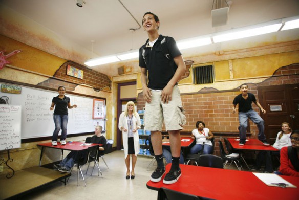 Andrew Arnold leads the class in a motivational chant from his desktop during Elizabeth Wolf's 8th-grade English class at Holmes Middle School (Covington Independent). Photo by Amy Wallot, May 15, 2012