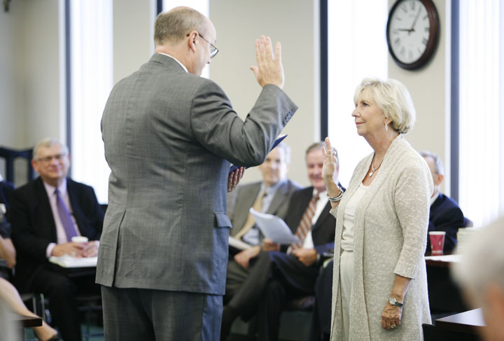Nawanna Privett is sworn in by Judge Phillip Shepherd as the newest member of the Kentucky Board of Education during last week's meeting in Frankfort, Ky. Photo by Amy Wallot, June 6, 2012
