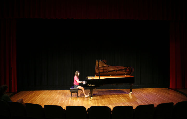 Henry Clay High School (Fayette County) junior Helen Lee performs "Rondo" by Ludwig van Beethoven during the Governor's School for the Arts. Lee said the experience was "awesome" and gave her new experiences like working with an ensemble and improved time management. Photo by Amy Wallot, July 6, 2012