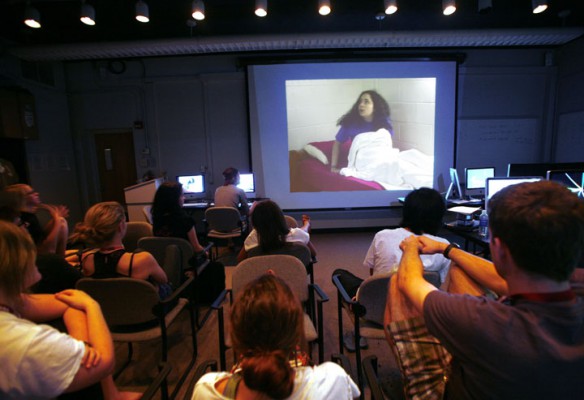 Students watch and critique a student-produced short film during the Governor's School for the Arts. Photo by Amy Wallot, July 6, 2012