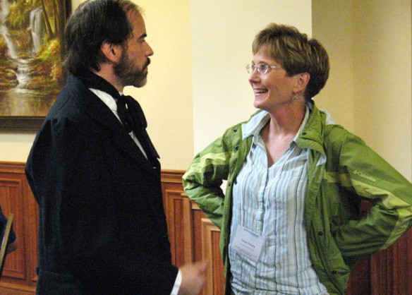 Kentucky Chautauqua performer Obadiah Ewing-Roush, as Berea founder John G. Fee, talks to Sioux Finney, a social studies teacher at Woodford County Middle School, after Ewing-Roush’s presentation at Boone Tavern in Berea. Photo by Matthew Tungate, July 13, 2012