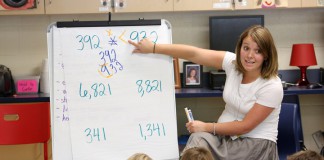 Krista Chatham reviews a worksheet with her 4th-grade class about how to compare numbers at Cartmell Elementary School (Carroll County). Photo by Amy Wallot, Aug. 21, 2012