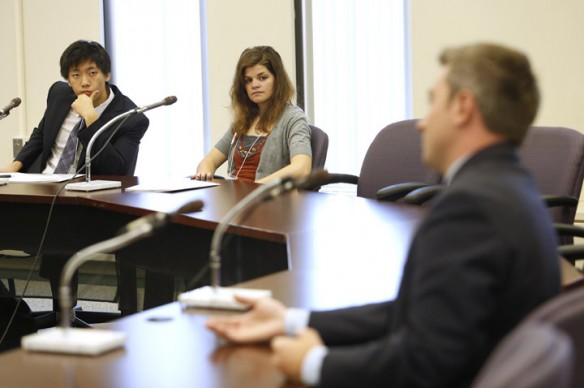 Vincent Cao and Natalie Fahrbach listen to Rep. Ryan Quarles, R-Georgetown, talk about education funding. Quarles sits on the house education committee. Photo by Amy Wallot, Oct. 24, 2012