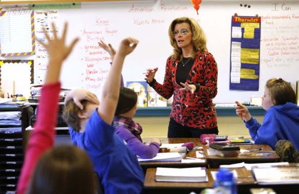 Fifth-grade teacher Ninya Sallee talks about the Revolutionary War with her class at Pilot View Elementary School (Clark County). The students started by first listing the things they already knew about the war and then the things they would like to learn about it. They followed that by examining the painting Washington Crossing the Delaware by Emanuel Gottlieb Leutze. Photo by Amy Wallot, Nov. 15, 2012