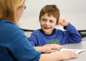 First-grade student Jerith Patterson has a great time working with Middle School Teacher of the Year Heidi Givens at Highland Elementary School (Daviess County). Photo by Amy Wallot, Nov. 27, 2012