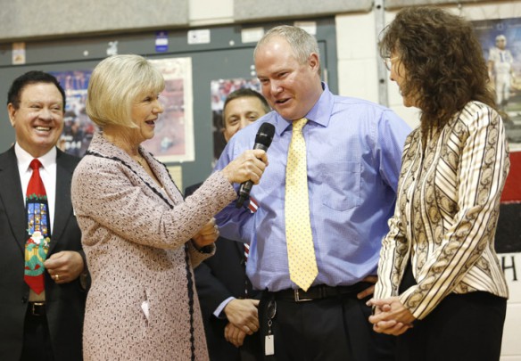 Third-grade teacher Ryan Williams talks with First Lady Jane Beshear after he was announced as the newest recipient of the Milken Family Foundation National Educator Award at Mary Lee Cravens Elementary School (Owensboro Independent). Photo by Amy Wallot, Dec. 11, 2012