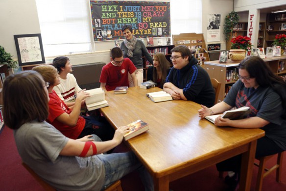 Library media specialist Terri Kirk talks with a group of about their favorite books at Reidland High School (McCracken County). Photo by Amy Wallot, Dec. 11, 2012