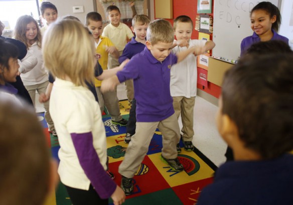 Holden Bays (center) leads the dance floor during Lederrick Wesley's music class at Bardstown Primary School (Bardstown Ind.). Photo by Amy Wallot, Jan. 23, 2013