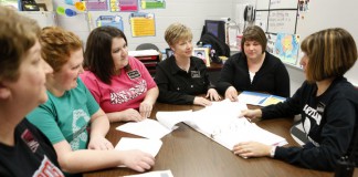 Kindergarten teacher Susan Burgess, 3rd-grade teacher Jenna Colson, special education teacher Charisse LaBoyteaux, 5th-grade teacher Gayla Routt, 2nd-grade teacher Krystal Miller and Principal Amily Campbell review data at Heartland Elementary School (Hardin County). They are all Pivotal Leadership participants. Each grade level at the school has a teacher participating in the program. Photo by Amy Wallot, March 15, 2013