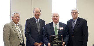 James Allen was presented the Joseph W. Kelly Award by the Kentucky Board of Education during their June meeting in Frankfort. Pictured from left are Commissioner Terry Holliday, Joseph Kelly, James Allen and KBE Chairman David Karem. Photo by Amy Wallot, June 5, 2013