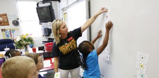 Amber Hayes teaches 2nd-grade students how to graph information at Indian Hills Elementary School (Christian County). Hayes likes how PGES helps with goal setting and fostering conversations with administrators.