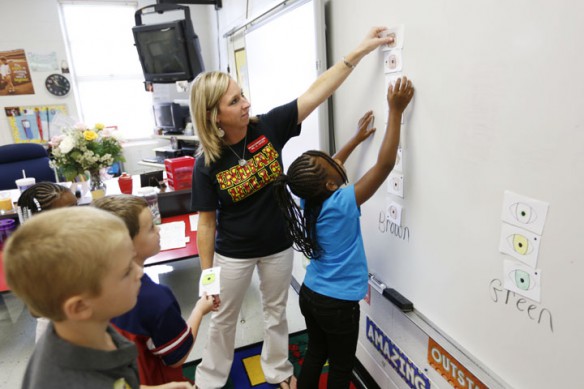 Amber Hayes teaches 2nd-grade students how to graph information at Indian Hills Elementary School (Christian County). Hayes likes how PGES helps with goal setting and fostering conversations with administrators.