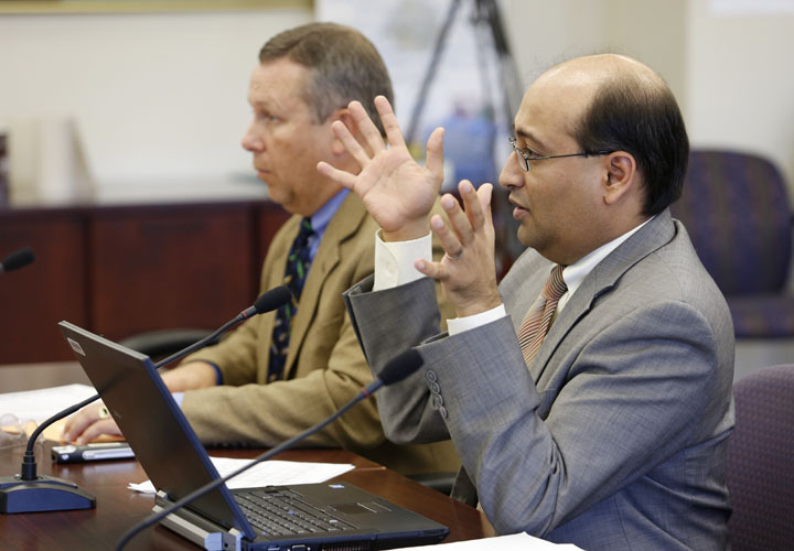Associate Commissioner Hiren Desai, right, and Budget and Financial Management Division Director Charles Harman present the biennial budget request to the Kentucky Board of Education. Photo by Amy Wallot, Oct. 8, 2013