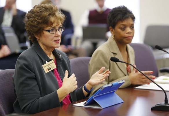 Kentucky Education Association Executive Director Mary Ann Blankenship and Office of Next-Generation Learners Associate Commissioner Felicia Cumings Smith discuss teacher evaluations as part of the Professional Growth and Effectiveness System (PGES) with the Kentucky Board of Education. Photo by Amy Wallot, Dec. 4, 2013