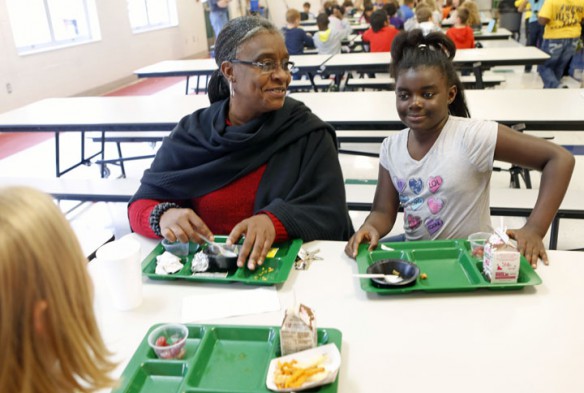 Linda Hill-Woolridge has lunch with her granddaughter 3rd-grade student Ryann Woods. Photo by Amy Wallot, Oct. 28, 2013