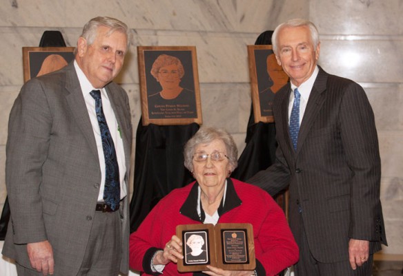 Former teacher Golda Pensol Walbert poses for a picture with Education Commissioner Terry Holliday, left, and Gov. Steve Beshear following her induction into the Gov.Louie B. Nunn Kentucky Teacher Hall of Fame in Frankfort. Photo by Clinton Lewis/WKU, Feb. 6, 2014