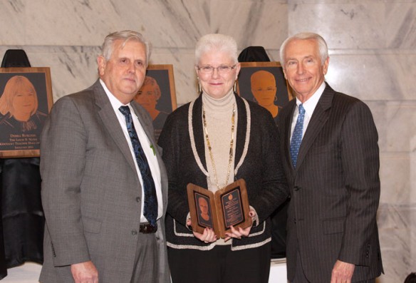 Kentucky Education Commissioner Terry Holliday, left, and Gov. Steve Beshear welcomed teacher Cynthia S. Wooden (Kenton County) into the Gov. Louie B. Nunn Kentucky Teacher Hall of Fame at the Capitol Rotunda. Photo by Clinton Lewis/WKU, Feb. 6, 2014