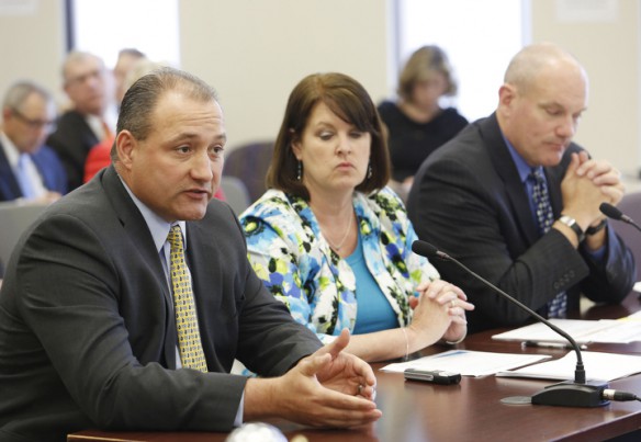 Floyd County Superintendent Henry Webb, Kenton County Superintendent Terri Cox-Cruey and Chief of Staff Tommy Floyd update the Kentucky Board of Education on the Superintendent Professional Growth and Effectiveness System. Photo by Amy Wallot, April 9, 2014