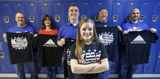 King Middle School (Mercer County) 8th-grade student Mackenzie Ezell designed the shirt used fro her school's fundraising efforts for the Kentucky National Guard Memorial. Social studies teachers Greg Warren, Connie Eades, Jason Bryant, Barry Moser and Mike Floro (and Tiffany Ison, not pictured) are helping with the project.