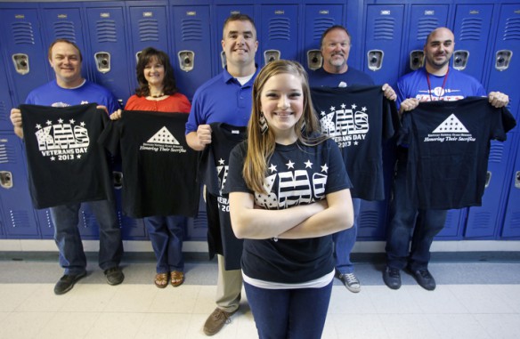 King Middle School (Mercer County) 8th-grade student Mackenzie Ezell designed the shirt used fro her school's fundraising efforts for the Kentucky National Guard Memorial. Social studies teachers Greg Warren, Connie Eades, Jason Bryant, Barry Moser and Mike Floro (and Tiffany Ison, not pictured) are helping with the project.