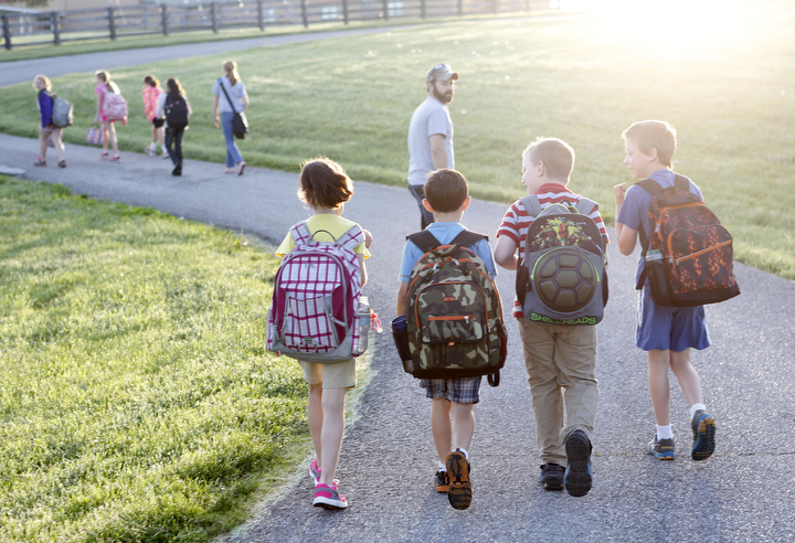 Students walk to school on a beautiful morning. Photo by Amy Wallot, May 7, 2014