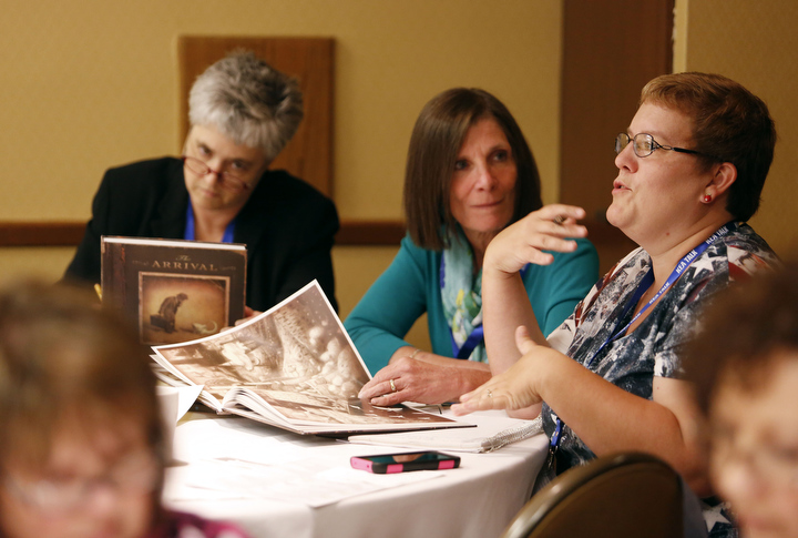 Amanda Bruce, Spencer County High School's special education chair, talks about how graphic novels work well with her students during the Power of the Graphic Novel session at the Let's TALK conference in Louisville. Photo by Amy Wallot, June 16, 2014