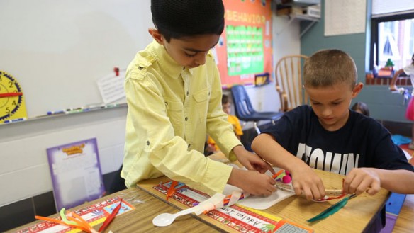 Mustfa Malik and Chase Smith work together building their design of an animal that could transfer a lot of pollen during Debbie Lewis' 2nd-grade class at Morningside Elementary School (Elizabethtown Independent). Photo by Amy Wallot, May 19, 2014