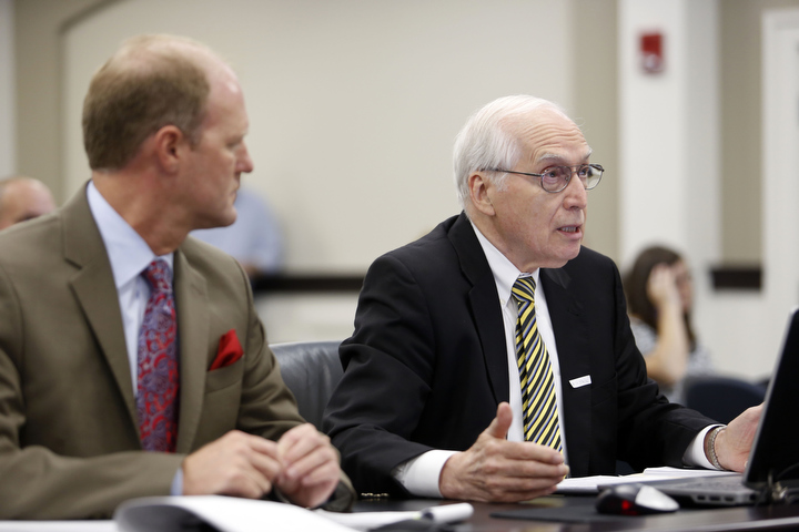 Associate Commissioner Dale Winkler and Vice President of the Southern Regional Education Board Gene Bottoms present "From Two Systems to One World-Class System of Technical Centers" to the interim joint committee on education. Photo by Amy Wallot, June 9, 2014
