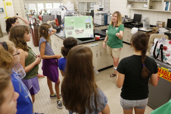 Associate Professor Czar Crofcheck talks with students about biosystems engineering. Photo by Amy Wallot, July 29, 2014