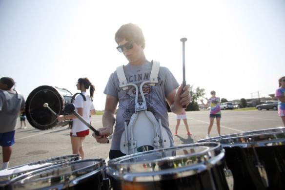 Junior Austin Slucher practices "Runaway Baby" by Bruno Mars on the quad drums during Western Hills High School (Franklin County) band camp. Photo by Amy Wallot, July 29, 2014