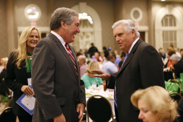 Conference chair Brigette Stacy, Lt. Gov. Jerry Abramson and Commissioner Terry Holliday talk before lunch. Photo by Amy Wallot, Sept. 24, 2014