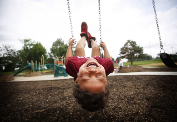 Northern Elementary School (Fayette County) 1st-grade student Christian Murillo during the Summer Food Service Program kickoff at Castlewood Park in Lexington. Photo by Amy Wallot, June 11, 2014