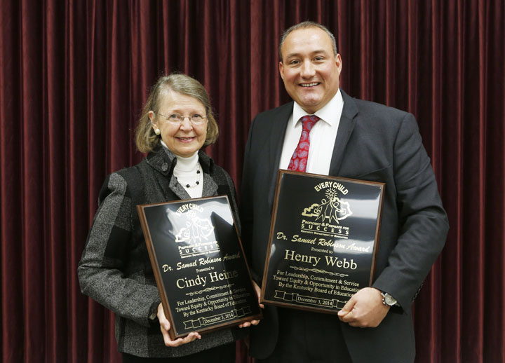 Cindy Heine and Henry Webb received the Dr. Samuel Robinson Award from the Kentucky Board of Education. Photo by Amy Wallot, Dec. 3, 2014