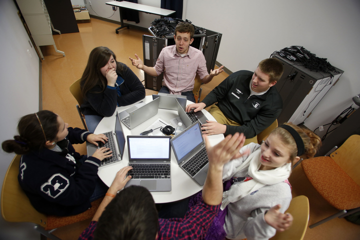 Shelby Clark, Loren Schuler, Grant Ross, Jason Fletcher, Sierra Boone and Drew Hurst, all students in the leadership dynamics class at Thomas Nelson High School (Nelson County), collaborate on marketing ideas for their Lead to Feed project. Photo by Amy Wallot, Jan. 8, 2015