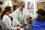 Kentucky High School Teacher of the Year Joshua Underwood gives instructions to juniors Megan Huber and Amanda Lee during chemistry class at Mason County High School. Photo by Amy Wallot, Jan. 9, 2015