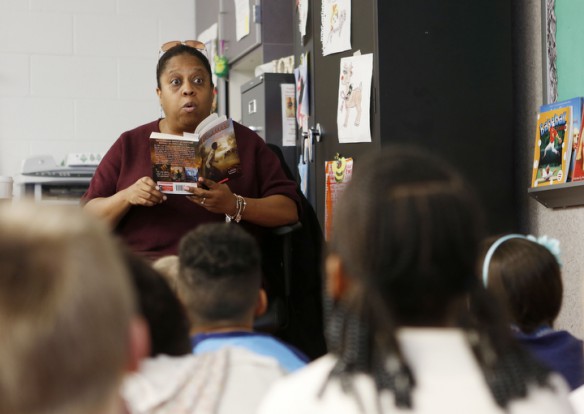 Third-grade teacher Pam Whitfield reads I Survived the Battle of Gettysburg, 1863 a historical fiction book by Lauren Tarshis at Stopher Elementary School (Jefferson County). Photo by Amy Wallot, Jan. 28, 2015