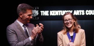 Tourism, Arts and Heritage Cabinet Deputy Secretary Lindy Casebier congratulates state champion Haley Bryan at the Poetry Out Loud Kentucky State Finals in Frankfort. Photo by Amy Wallot, March 12, 2015