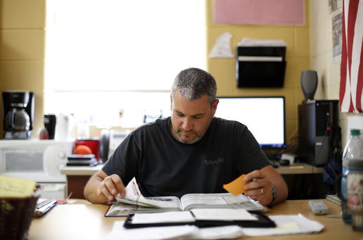 World civics teacher Chad Starrett prepares for a lesson during his planning period at McCreary Central High School (McCreary County). McCreary County had 100 percent participation in the Kentucky TELL survey. Photo by Amy Wallot, May 20, 2015