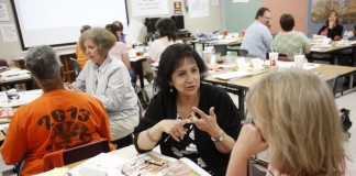 Crawford Middle School (Fayette County) ESL teacher Fariba Atlaschi and Beaumont Middle School (Fayette County) social studies teacher Patt Owen share tips for working with students during the Kentucky Writing Project workshop on English-language learners. Photo by Amy Wallot, June 10, 2015