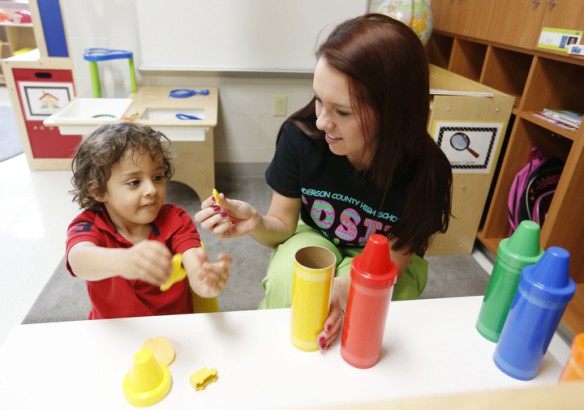 Senior Cammy Hester works with Romeo, a 3-year-old student, at the Thelma B. Johnson Early Learning Center as part of HCHS's Early Childhood Education program. Photo by Amy Wallot, May 11, 2015