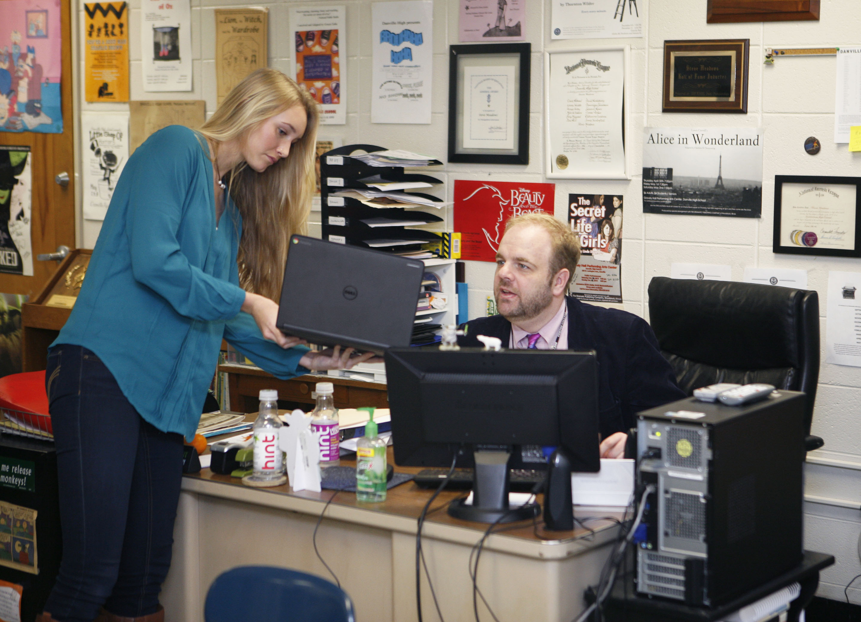 Kelsie Steber, a sophomore at Danville High School (Danville Independent) shows her work to teacher Steve Meadows during a’ Speech II-III-IV class. Meadows has taught speech classes at Danville for 22 years. Photo by Mike Marsee, Nov. 30, 2015