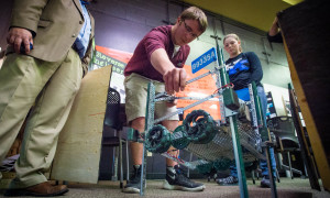 iLEAD freshman Jason Gray, of Owen County, demonstrates a robot that he built at the school's demonstration night. Photo by Bobby Ellis, March 24, 2016