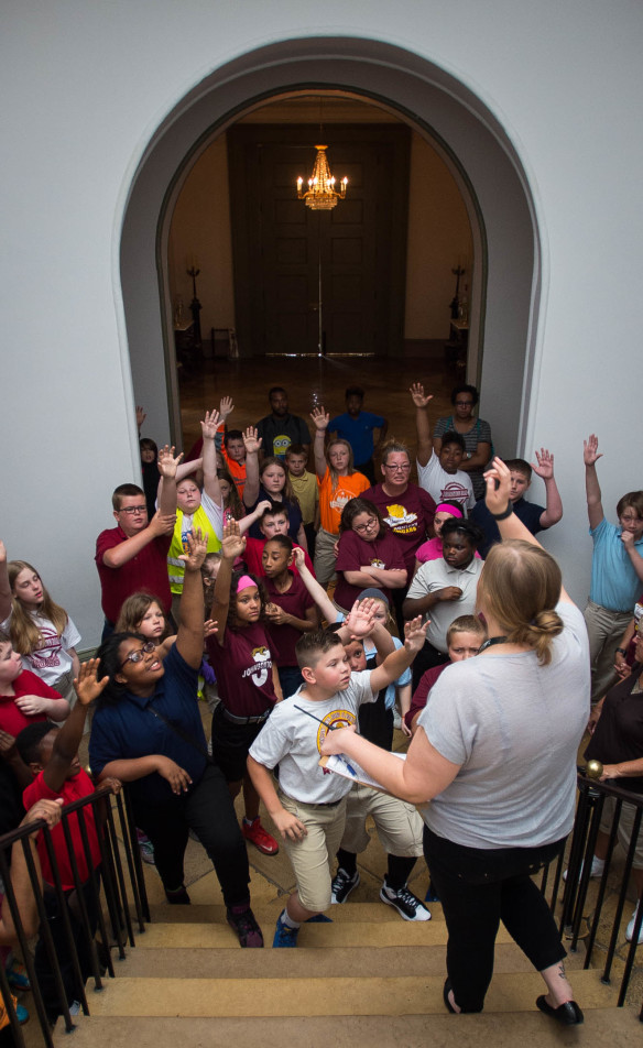 Johnsontown Road Elementary students raise their hands to answer a question while touring the Old Capitol building in Frankfort. Photo by Bobby Ellis, April 19, 2016