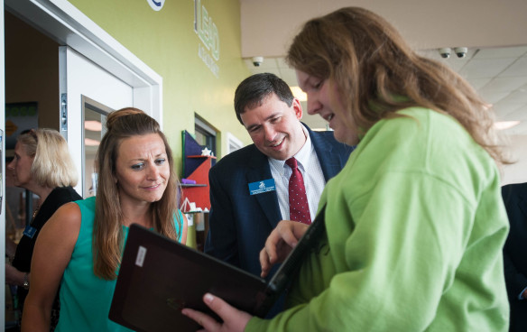 Education Commissioner Stephen Pruitt talks to Blake Jaggers, a 9th-grader from Carol County High School, about Jaggers' Civil War webpage during his visit to the iLead Academy in Carrollton. Photo By Bobby Ellis, April 25, 2016