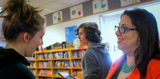 Emily Northcutt, right, the library media specialist at LeGrande Elementary School (Hart County), works with student Haley Lewis, left, as student Evan Minor listens in. Northcutt was the only school librarian to sign on for The Fund for Transforming Education in Kentucky’s Next Generation Instructional Design project, where she is part of a group of teachers who are designing lessons that implement the Kentucky Academic Standards for Science. Photo by Kaitlyn Mathis, April 21, 2016