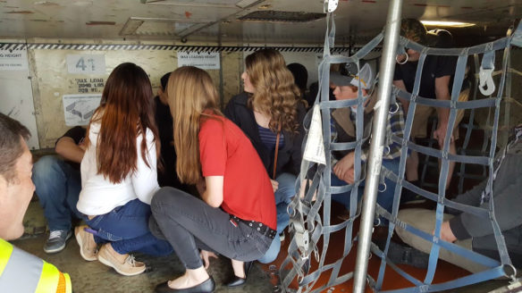 Students from Bellevue Independent, Boone, Bracken, Campbell County, Ludlow Independent, Newport Independent and Pendleton and get a firsthand look at the cargo area of a plane and discover what it takes to work in such a small space and what the job entails. Photo by Hallie Hundemer-Booth