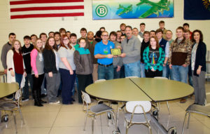 Robert Sterling, center left, of Iron Workers Local 782, and Kevin Chatellier, center right, the welding instructor at Ballard Memorial High School (Ballard County) stand with seniors from the school’s welding, industrial maintenance and agriculture classes who passed the OSHA 10 safety course. Required by construction and maritime workplaces, the course was offered by the school this year for the first time. Chatellier worked to make the 10-hour course available to Ballard Memorial students and Sterling, an OSHA-certified instructor, taught the course. Photo submitted