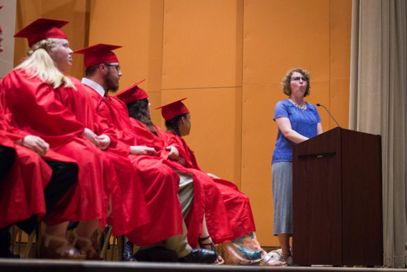 The Kentucky School for the Blind graduating class listens to a commencement address by Kathy Nimmer. Photo by Bobby Ellis, May 25, 2016