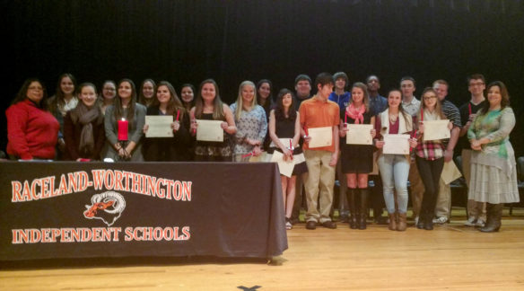 Raceland-Worthington and Russell Independent students after the induction ceremony into the Spanish Honor Society. On the far left is Catherine del Valle, Spanish teacher at Russell Independent High School; and on the far right is Zenaida Smith, Spanish teacher at Raceland-Worthington High School.