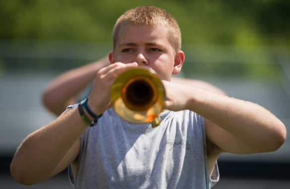Zach Caudill stands at attention with his trumpet during the second day of the Johnson Central High School band camp. Photo by Bobby Ellis, July 19, 2016 